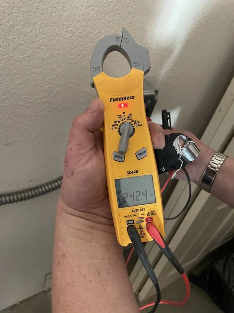 Voltage testing with clamp meter during Electrical Installation Services in Monte Vista